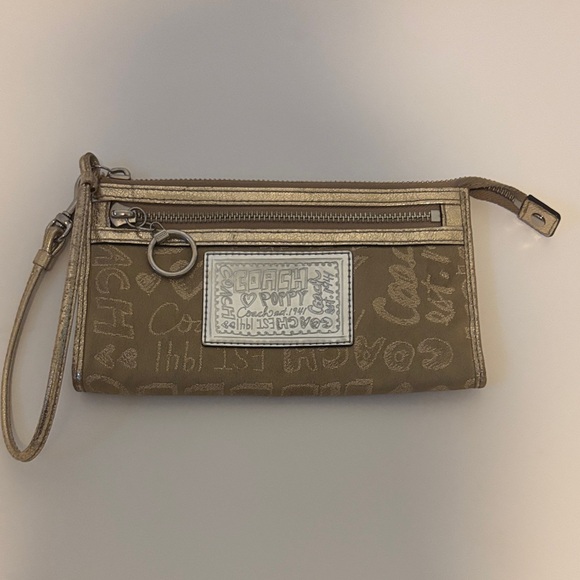Coach Handbags - Coach Gold Signature Wristlet Clutch